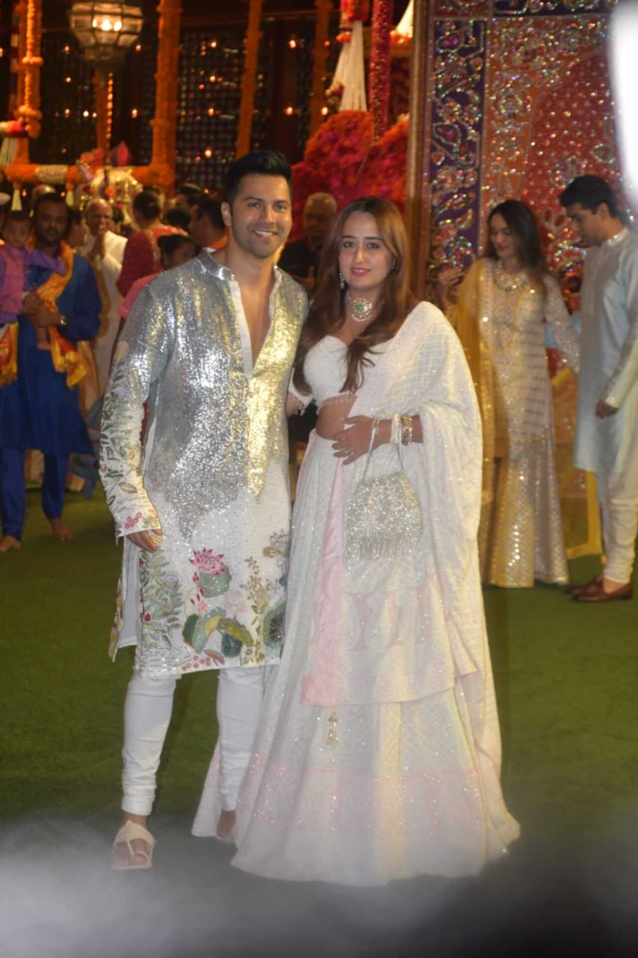 Star couple Varun Dhawan and Natasha Dalal were twinning in silver and white